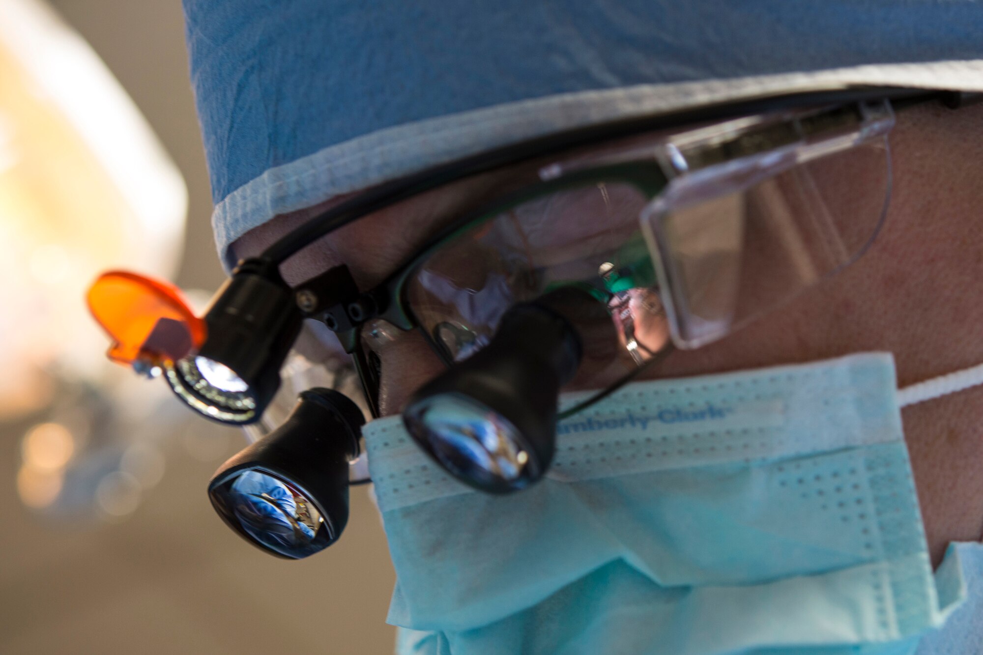 U.S. Air Force Capt. Jeremy Matis, 354th Dental Services Flight general dentist, performs oral surgery at Eielson Air Force Base, Alaska, Feb. 19, 2015. Wisdom teeth are located at the back of the mouth. They are difficult to reach to properly clean which can lead to infection and the need to remove them. (U.S. Air Force photo by Staff Sgt. Joshua Turner/Released)