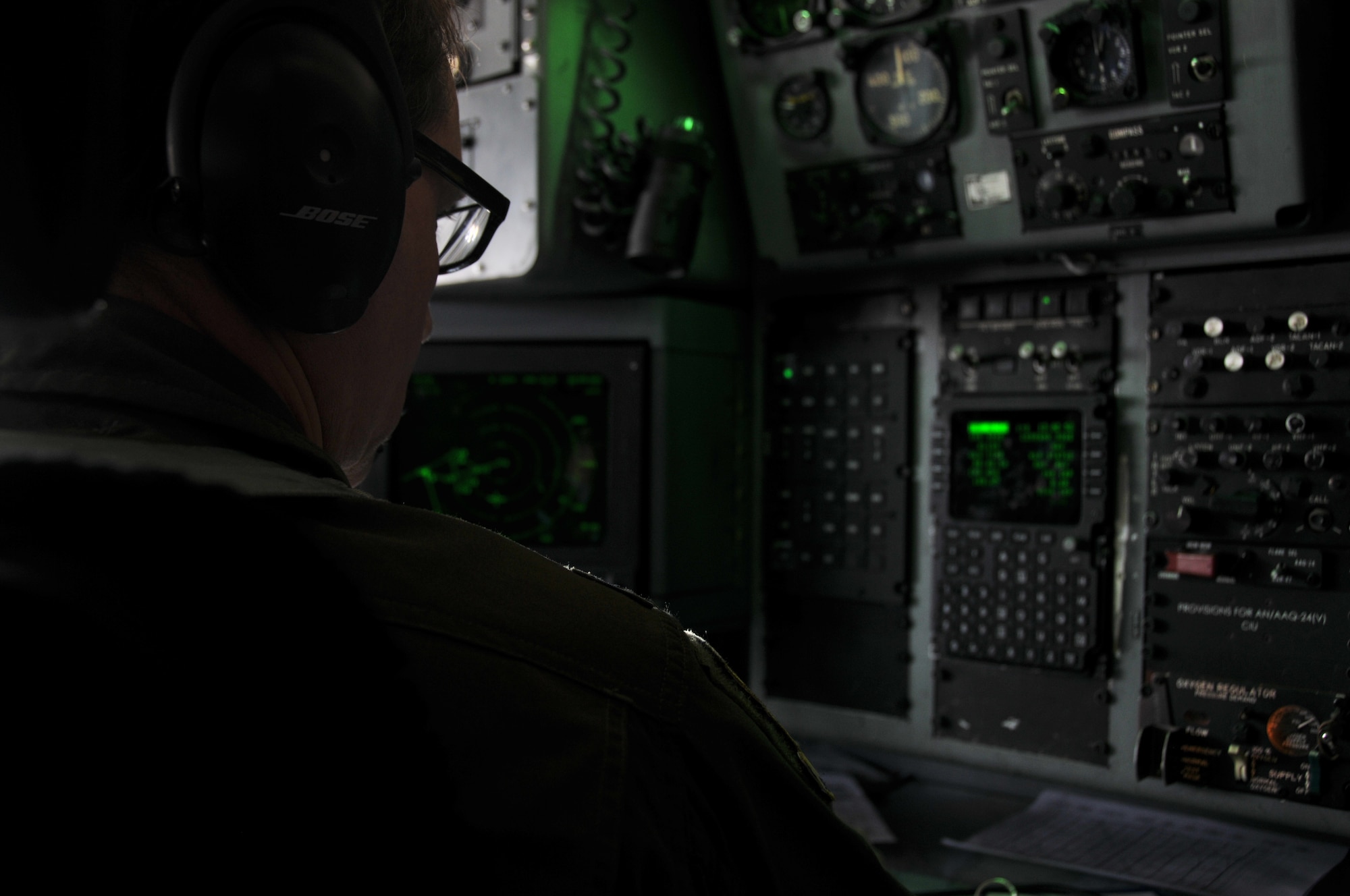 Lt. Col. Aldo Filoni, primary evaluator navigator with the 911th Operations Group, works during an all- weather airdrop delivery system exercise sortie in a C-130 Hercules in flight, near the drop zone in Cadiz, Ohio, March 7, 2015. This sortie simulated an airdrop in extremely reduced visibility conditions. (U.S. Air Force photo by Senior Airman Marjorie A. Bowlden)

