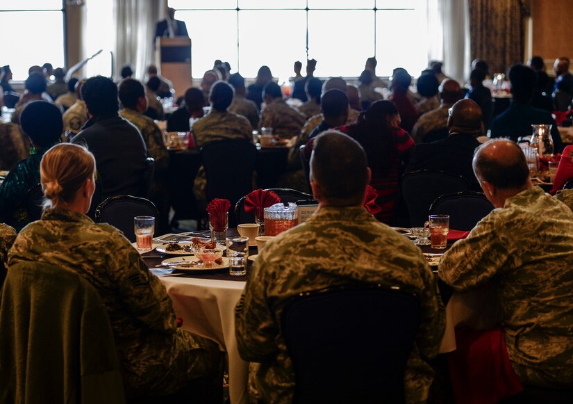 U.S. Service members attend a Black History Month Luncheon at Langley Air Force Base, Va., March 10, 2015. During the luncheon, George Wallace, Hampton mayor, attended the event as the guest speaker. (U.S. Air Force photo by Senior Airman Kayla Newman/Released)