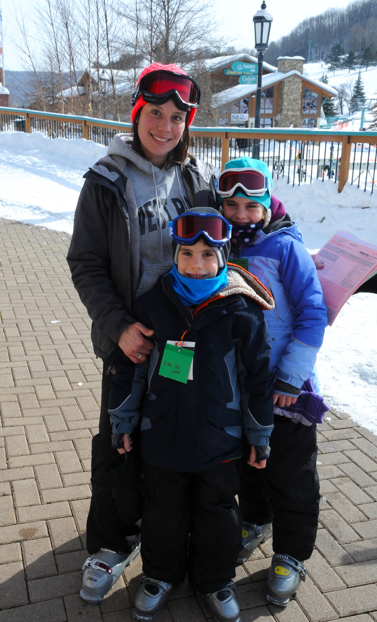 Meg Calero,  914th Force Support Squadron, Airman and Family Readiness coordinator, poses for a picture with her children at Holiday Valley Ski Resort in Ellicottville, New York on Feb 16, 2015. Calero was participating in a 914th Airlift Wing sponsored event. (U.S. Air Force photo by Staff Sgt. Matthew Burke)