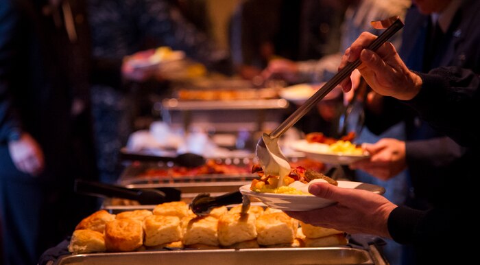 Guests attending the 2015 National Prayer Breakfast were presented with several breakfast options March 11, 2015, at the Red Bank Club on Joint Base Charleston – Weapons Station. All guests were treated to a free breakfast and had a chance to listen to speakers read scripture readings from different religions. (U.S. Air Force photo/Airman 1st Class Clayton Cupit)