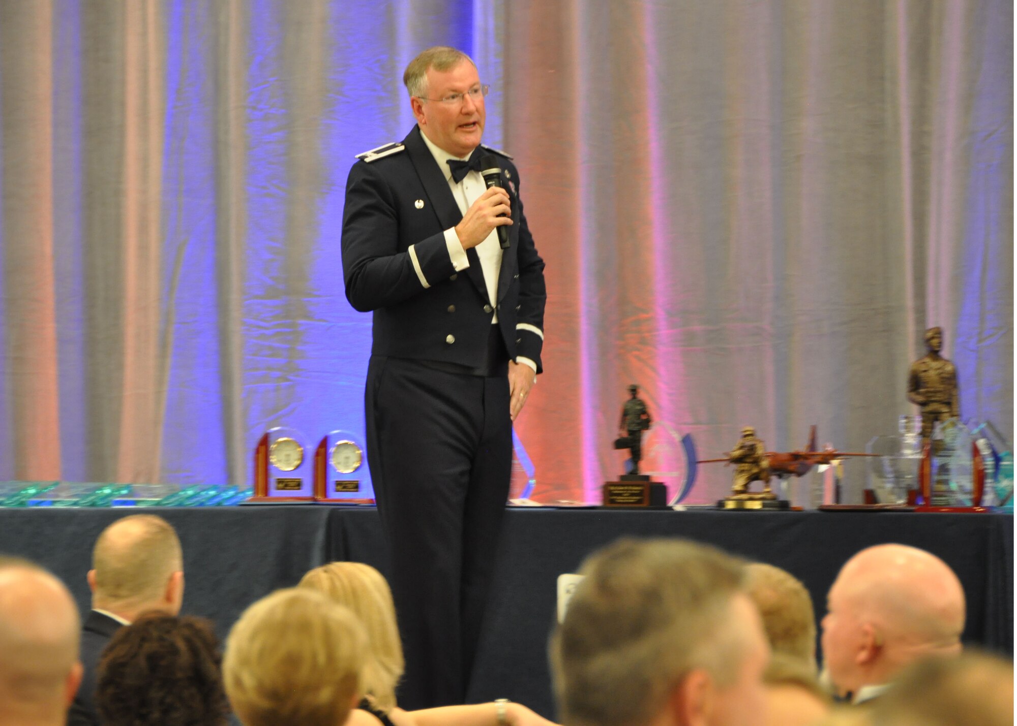 Col. Jeffrey A. Van Dootingh, 911th Airlift Wing commander, welcomes attendees to the 2015 911th Airlift Wing Awards Banquet, March 7, 2015. The annual awards banquet is held each year to recognize the hard work and dedication of the 911th AW’s Airmen and civilian employees.  (U.S. Air Force photo by Staff Sgt. Jonathan Hehnly)