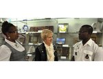 Dawna Hollie (left), Ambassador of the International Goodwill to Others (AMIGO) program manager, speaks with Jan Hall (center), an AMIGO sponsorship program volunteer, and Lt. Aboudou Ganihou Fadikpe (right), a Defense Language Institute English Language Center student at Joint Base San Antonio-Lackland. The DLIELC hosts the AMIGO program to create an opportunity for students to have a more personable American cultural experience and a chance to practice the English language. (courtesy photo)