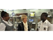 Dawna Hollie (left), Ambassador of the International Goodwill to Others (AMIGO) program manager, speaks with Jan Hall (center), an AMIGO sponsorship program volunteer, and Lt. Aboudou Ganihou Fadikpe (right), a Defense Language Institute English Language Center student at Joint Base San Antonio-Lackland. The DLIELC hosts the AMIGO program to create an opportunity for students to have a more personable American cultural experience and a chance to practice the English language. (courtesy photo)