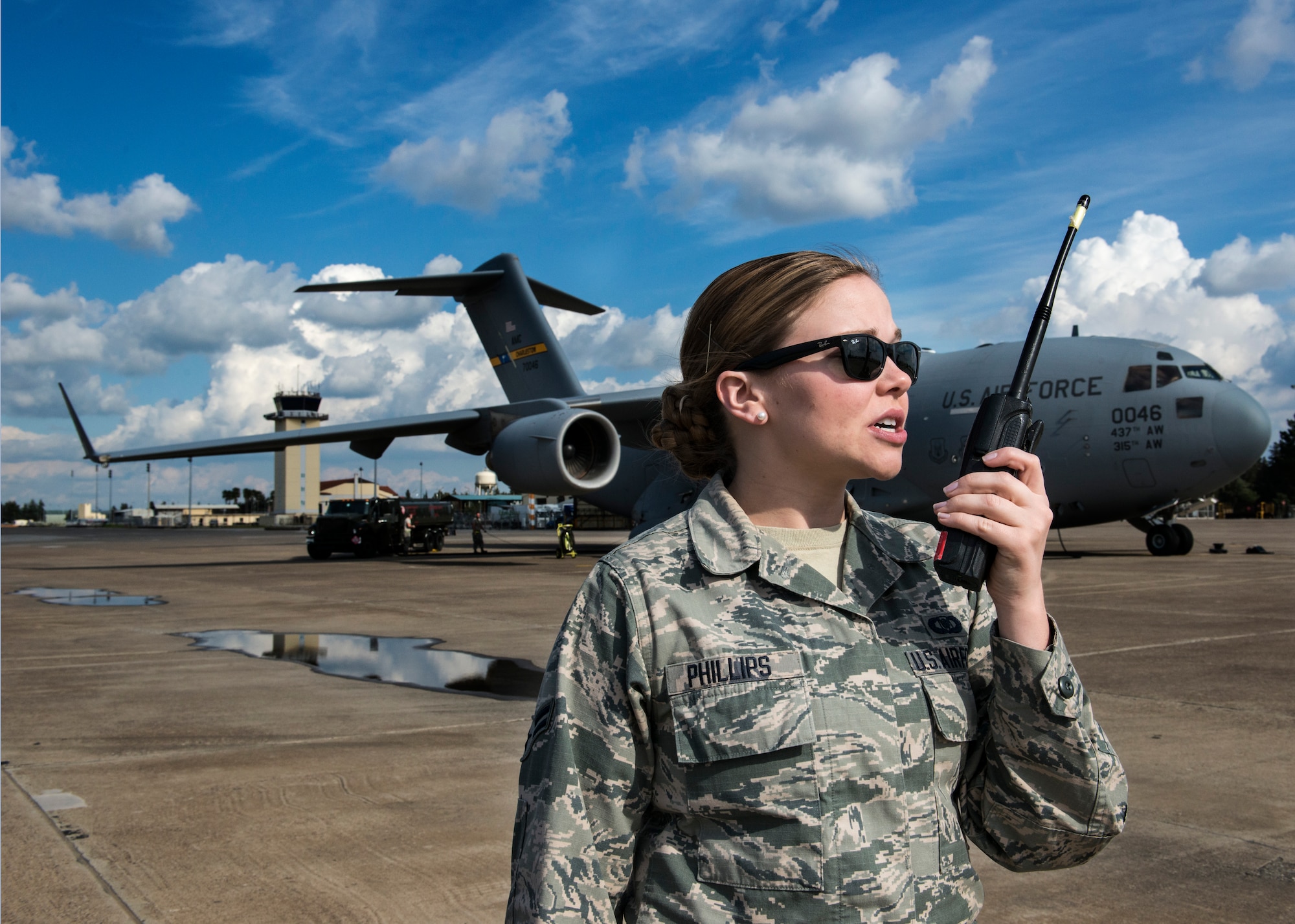 Airman 1st Class Devan Phillips, 39th Operations Support Squadron airfield management operations coordinator apprentice, radios the air traffic control tower March 2, 2015, at Incirlik Air Base, Turkey. The 39th OSS Airfield Management office is in charge of coordinating flights between all agencies required for U.S and international missions. (U.S. Air Force photo by Airman Cory W. Bush/Released)
