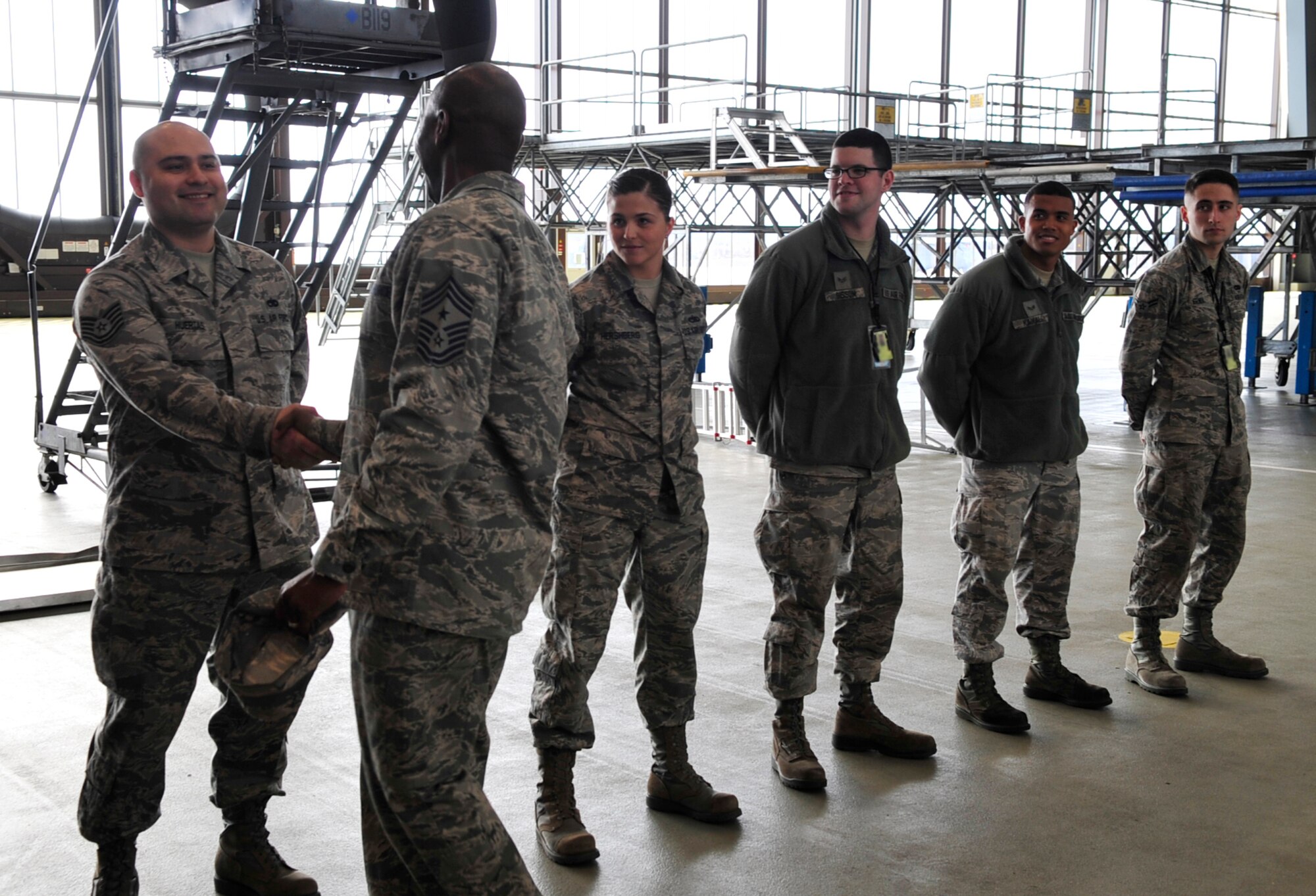 Chief Master Sgt. Kaleth Wright, 3rd Air Force command chief master sergeant, talks to Airmen during his immersion tour on March 2, 2015, at Ramstein Air Base, Germany. Airmen here had the opportunity to demonstrate their capabilities and speak to Wright about his experiences and Air Force current events. (U.S. Air Force photo/Airman 1st Class Larissa Greatwood)