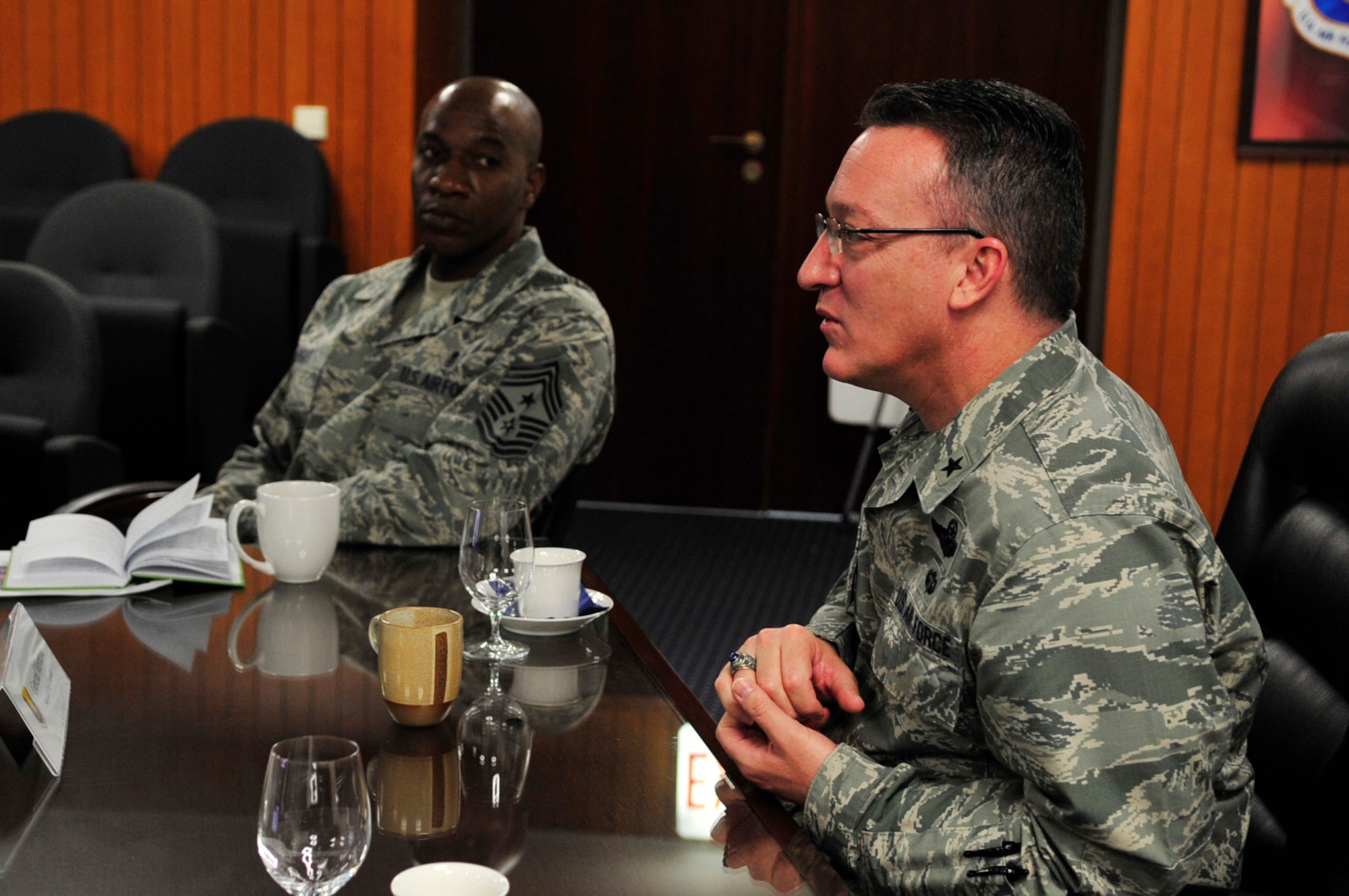Brig. Gen. Patrick Mordente, 86th Airlift Wing commander, briefs Chief Master Sgt. Kaleth Wright, 3rd Air Force command chief master sergeant, March 2, 2015, at Ramstein Air Base, Germany. Mordente and Wright discussed Ramstein's mission and the capabilities of the Airmen here. (U.S. Air Force photo/Airman 1st Class Larissa Greatwood)