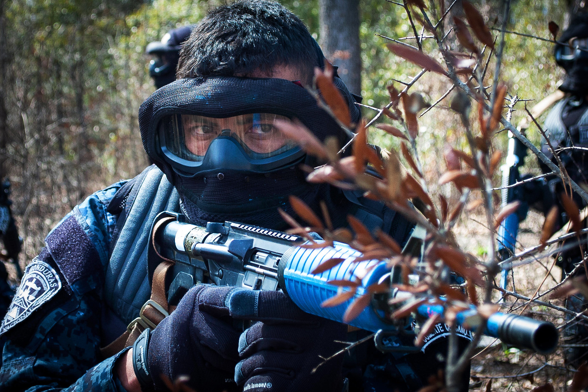 A Honduran commando establishes a security perimeter while training ...