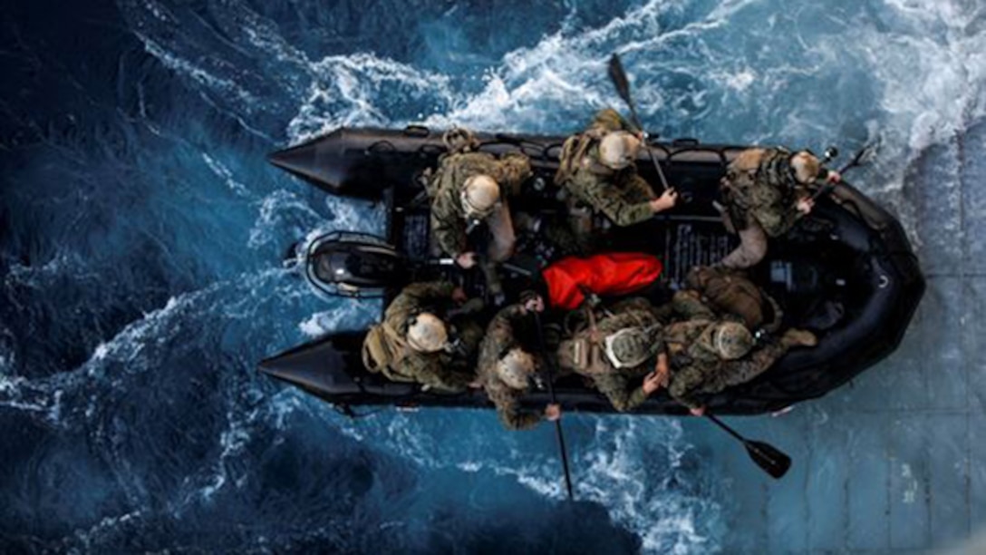 U.S. Marines with the 15th Marine Expeditionary Unit’s Maritime Raid Force depart the USS Essex (LHD 2) on a combat rubber raiding craft during Amphibious Squadron Three/Marine Expeditionary Unit Integration Training (PMINT) off the coast of San Diego March 4, 2015. The MRF used CRRCs during a precision raid exercise in preparation for their deployment later this spring.