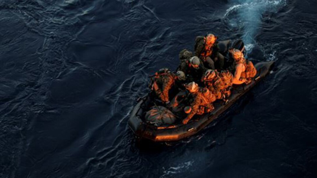 U.S. Marines with the 15th Marine Expeditionary Unit’s Maritime Raid Force depart the USS Essex (LHD 2) on a combat rubber raiding craft during Amphibious Squadron Three/Marine Expeditionary Unit Integration Training (PMINT) off the coast of San Diego March 4, 2015. The MRF used CRRCs during a precision raid exercise in preparation for their deployment later this spring. 