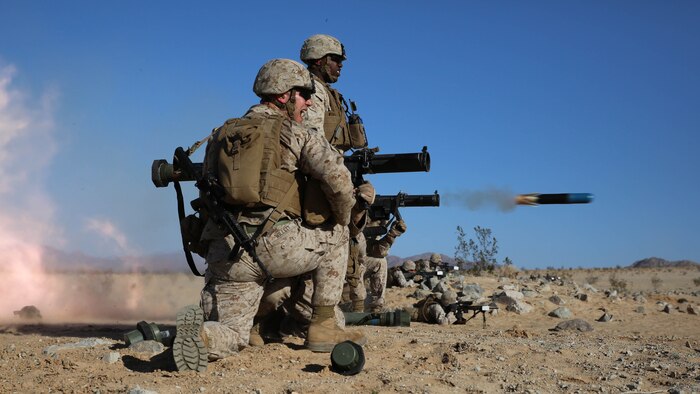 Anti-tank missileman with Anti-Armor Section, Weapons Company, Ground Combat Element Integrated Task Force, fire the MK153 shoulder-launched multipurpose assault weapon (SMAW) during the enemy counter attack portion of a Marine Corps Operational Test and Evaluation Activity assessment at Range 107, Marine Corps Air Ground Combat Center Twentynine Palms, March 7, 2015. From October 2014 to July 2015, the GCEITF will conduct individual and collective level skills training in designated ground combat arms occupational specialties in order to facilitate the standards-based assessment of the physical performance of Marines in a simulated operating environment performing specific ground combat arms tasks.