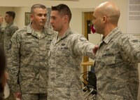 Master Sgt. James Goswick, the Airman Leadership School commandant, aligns Airmen during a formation used for inspections at Vance Air Force Base, Oklahoma, Feb. 24, 2015. The Airmen are members of the first ALS class at Vance. (Courtesy photo) 