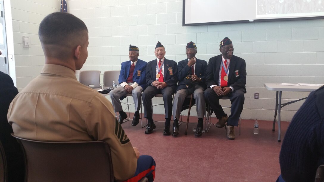 Four of the original Montford Point Marines spoke to the Marines of Recruiting Station New York about their experiences at the Bethpage Community Park Feb. 27. The Montford Point Marines fought two wars, one abroad and one at home. While they fought for freedom overseas, they returned home to a nation that was separate and unequal. Breaking through racial barriers, they transformed the face of the Marine Corps.
