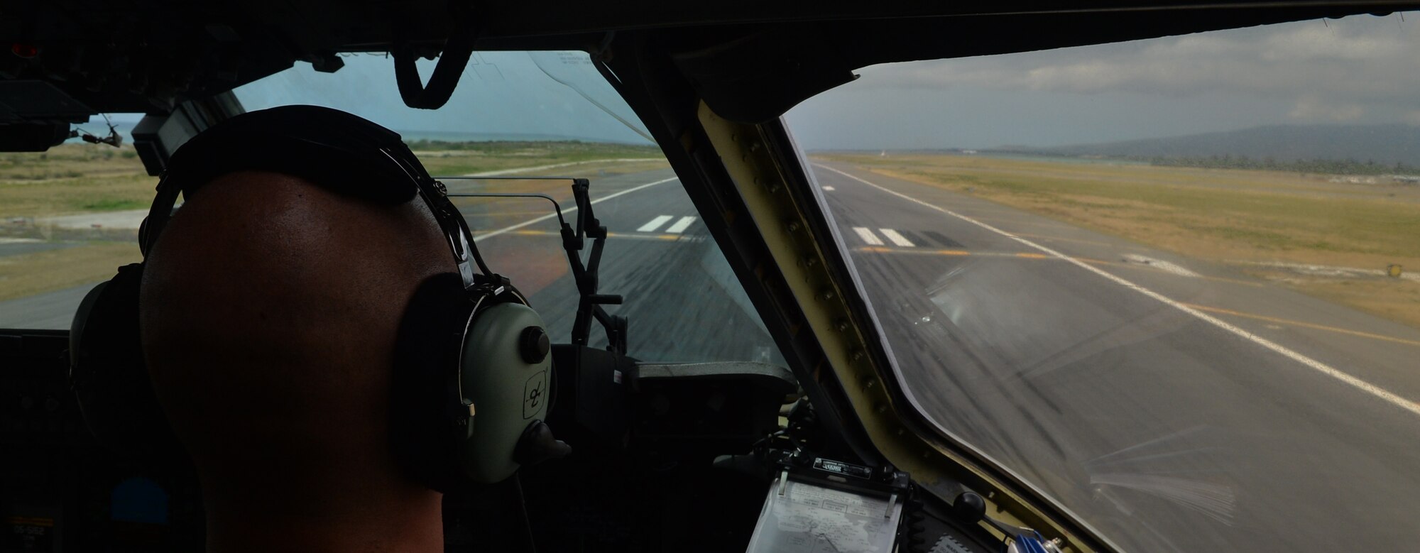 Capt. Cory Apodaca, a pilot from the 535th Airlift Squadron, lands a C-17 Globelmaster III on Joint Base Pearl Harbor-Hickam, Hawaii, Feb. 27, 2015. The aircraft and crew are returning from an airdrop operation in support of the 25th Infantry Division’s exercise Lightning Forge. (U.S. Air Force photo by Tech. Sgt. Aaron Oelrich/Released)