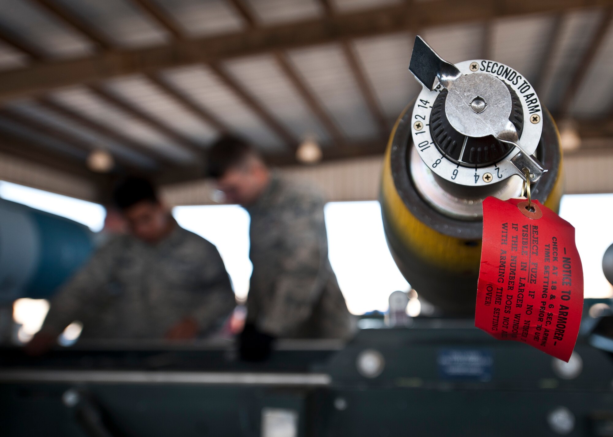 A munition sits on the rack at the munitions storage area on Nellis Air Force Base, Nev., March 10, 2015. AMMO supports the flying mission at Nellis AFB by providing various munitions to assigned or temporary units. (U.S. Air Force photo by Staff Sgt. Siuta Ika) 