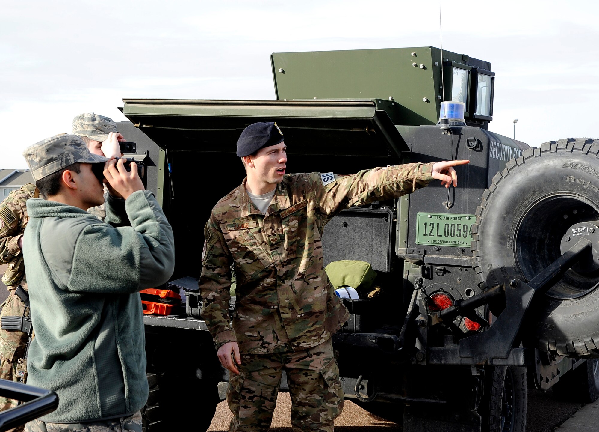Staff Sgt. Paul Lewis, 741st Missile Security Forces Squadron team leader, shows Airmen the equipment security forces personnel use when escorting missile maintainers to the missile field and at the launch facilities, during a mission orientation tour at Malmstrom Air Force Base, Mont . (U.S. Air Force photo/Staff Sgt. Delia Marchick)