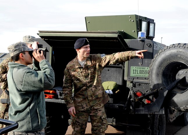 Staff Sgt. Paul Lewis, 741st Missile Security Forces Squadron team leader, shows Airmen the equipment security forces personnel use when escorting missile maintainers to the missile field and at the launch facilities, during a mission orientation tour at Malmstrom Air Force Base, Mont . (U.S. Air Force photo/Staff Sgt. Delia Marchick)