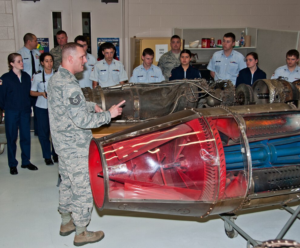 U.S. Air Force Tech. Sgt. Adam McDonald, 361st Training Squadron aerospace propulsion instructor, demonstrates a training model of a C-130 aircraft engine to the Burkburnett High School Air Force Junior ROTC cadets on Sheppard Air Force Base, Texas, March 11, 2015. The AFJROTC cadets are part of a base tour hosted by the Sheppard Air Force Base Public Affairs Department. (U.S. Air Force photo by Frank Carter/Released)