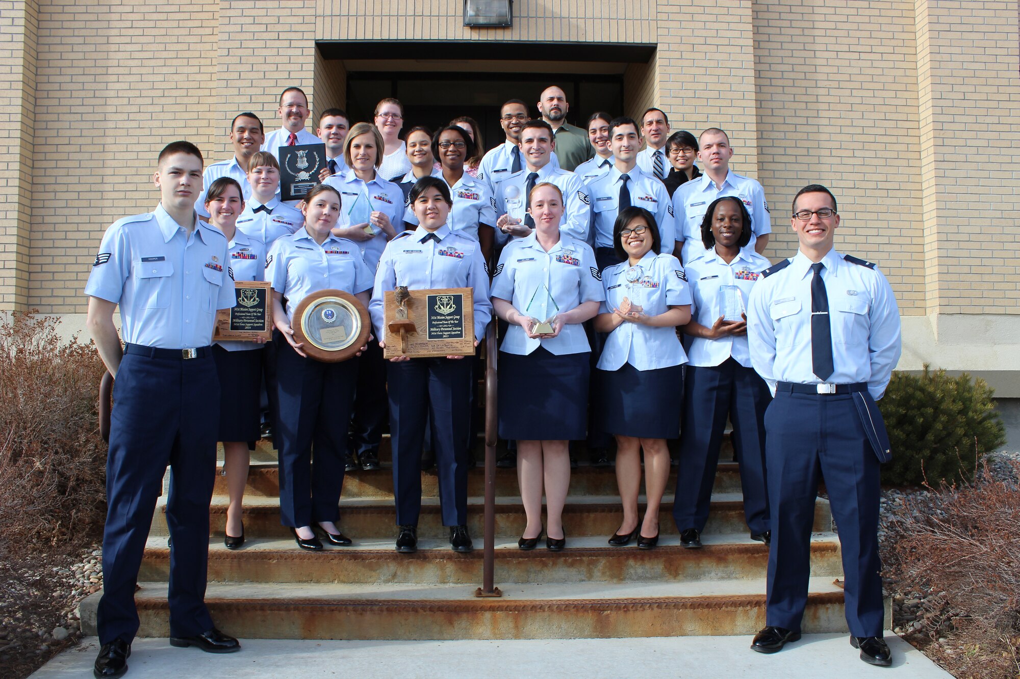 Members of the 341st Force Support Squadron military personnel section pose for a photo Feb. 18 with the awards they have won at Malmstrom Air Force Base, Mont. In the past six years, the team has won five Global Strike Command awards, two 341st Mission Support Group awards, one 20th Air Force award and one Air Force award for various excellences in the MPS field. (Courtesy photo)