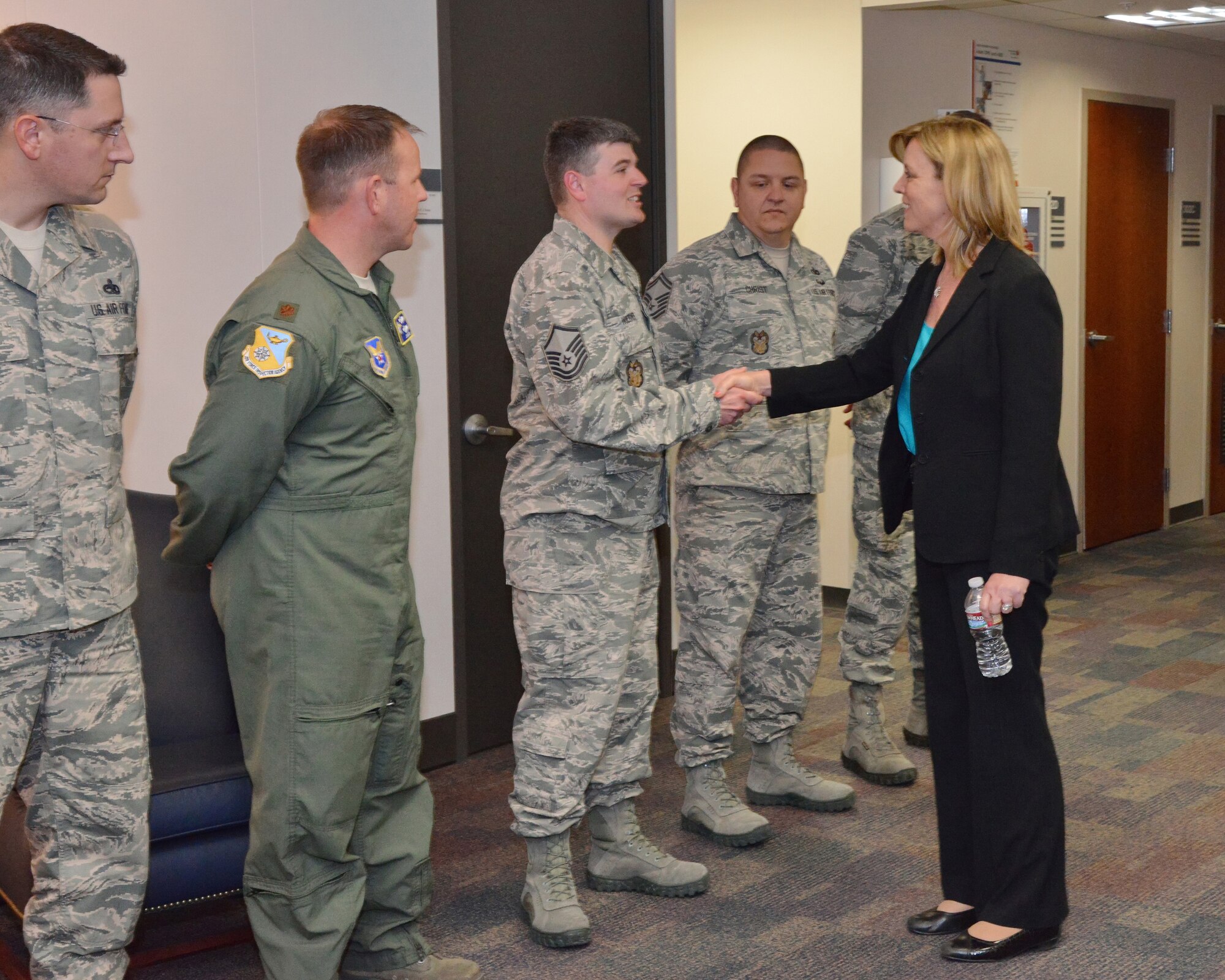 Secretary of the Air Force Deborah Lee James greets Airmen from the Air Force Inspection Agency during her visit to Kirtland March 10. (Photo by Jamie Burnett)
