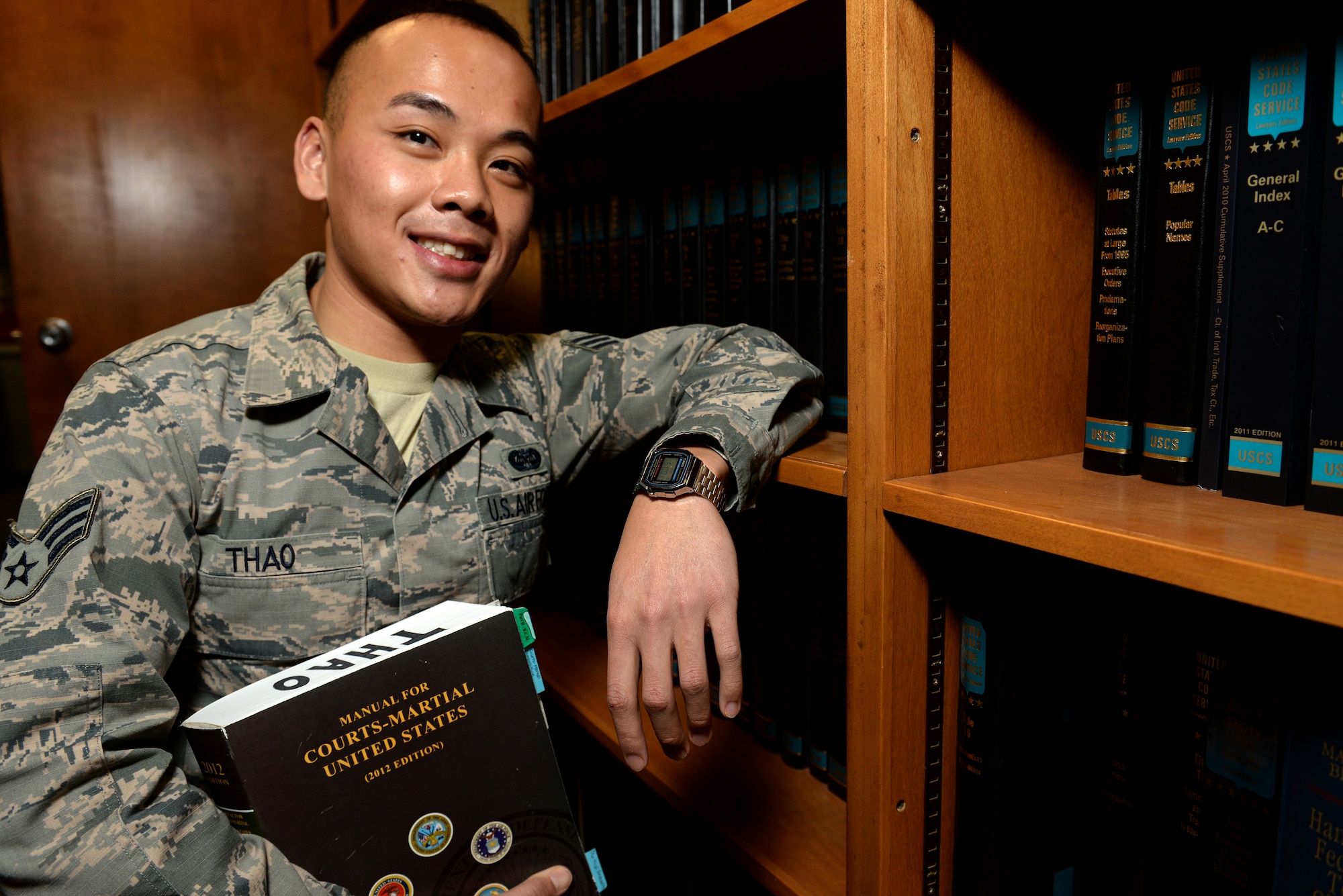Senior Airman Yia Thao, a 19th Airlift Wing Judge Advocate paralegal, was born in Thailand in the American refugee camp of Bamvinah. Thao was recently selected for the Airman Scholarship Commissioning Program, that offers active duty enlisted personnel, who can complete all bachelor degree and commissioning requirements in 2 to 4 years, the opportunity to earn a commission as an Air Force ROTC cadet. (U.S. Air Force photo by Staff Sgt. Jessica Condit)