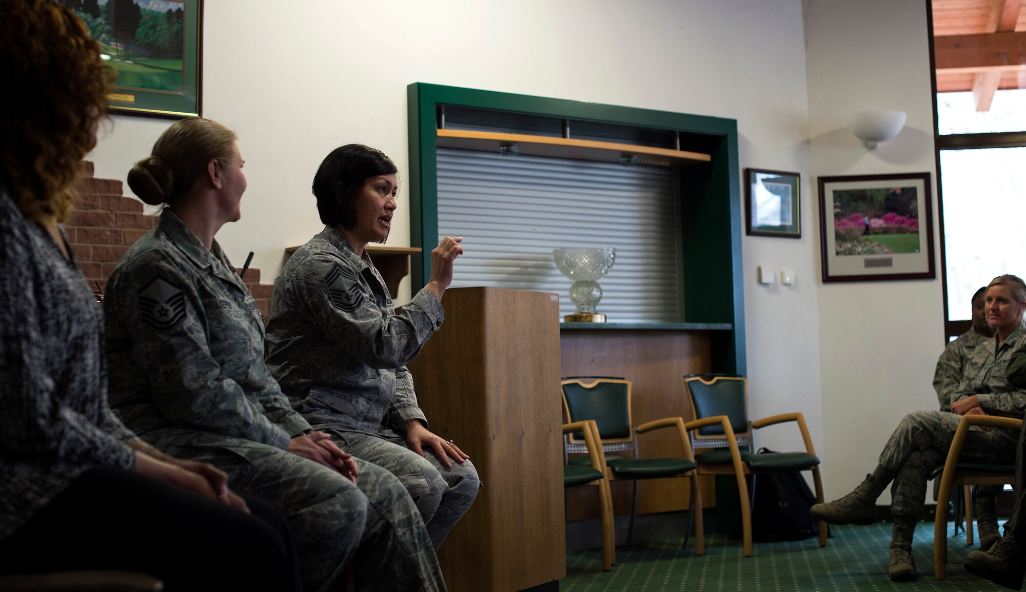 Chief Master Sgt. Joanne Bass, 86th Operations Group superintendent, speaks to female service members about time management during a seminar hosted by the ‘Lets Connect’ group at Ramstein Air Base, Germany, March 10, 2015. The forum was designed to confront issues unique to women balancing a military career and a personal life at home. Attendees had the opportunity to hear not only from women in leadership roles throughout the Kaiserslautern Military Community, but women who also have different backgrounds. (U.S. Air Force photo/Senior Airman Damon Kasberg)