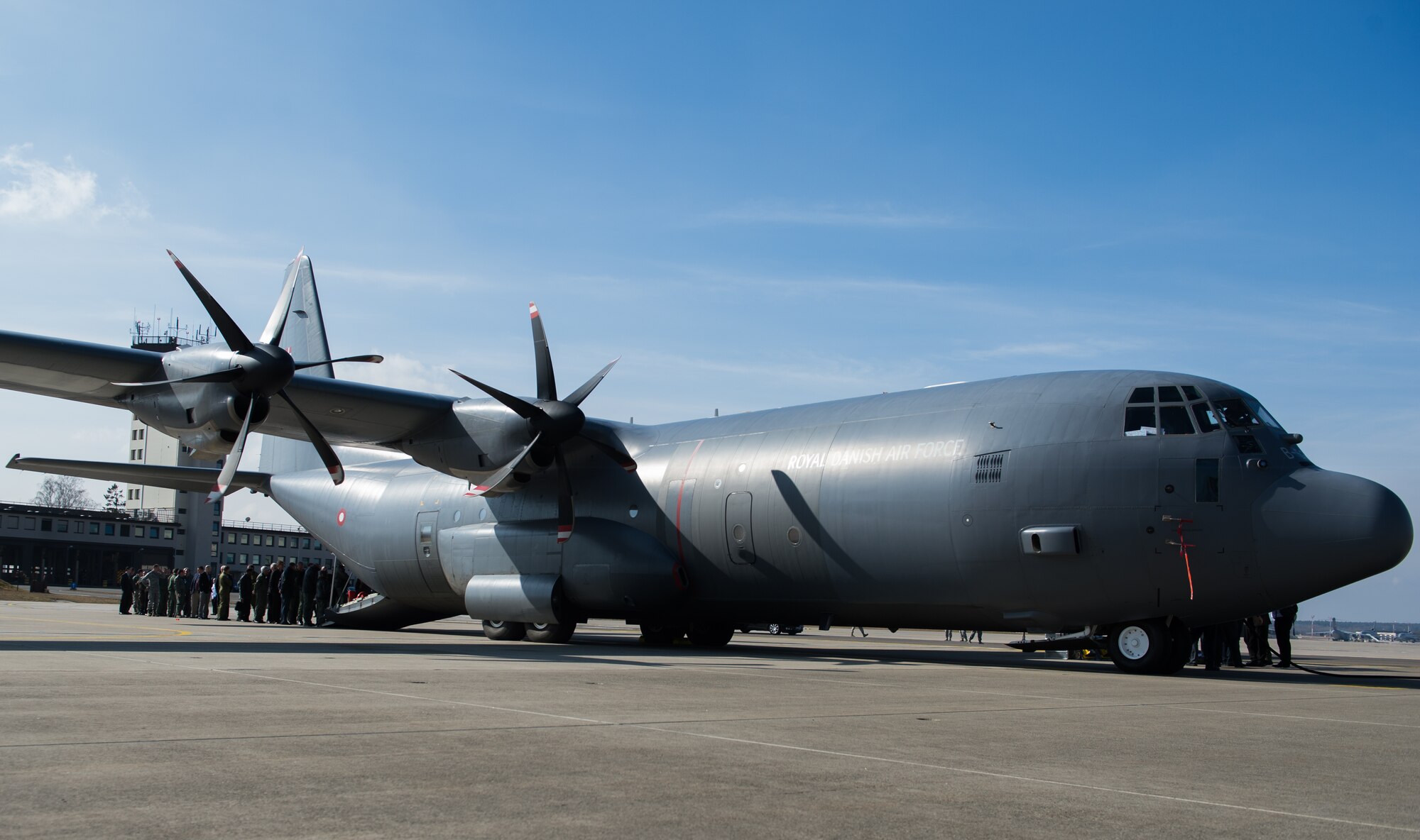 Military aerospace professionals wait in line to view a Royal Danish air force aeromedical evacuation unit at Ramstein Air Base, Germany, March 11, 2015. Ramstein hosted an annual summit to share medical knowledge and build relations ships between 19 nations. (U.S. Air Force photo/Staff Sgt. Armando A. Schwier-Morales) 
