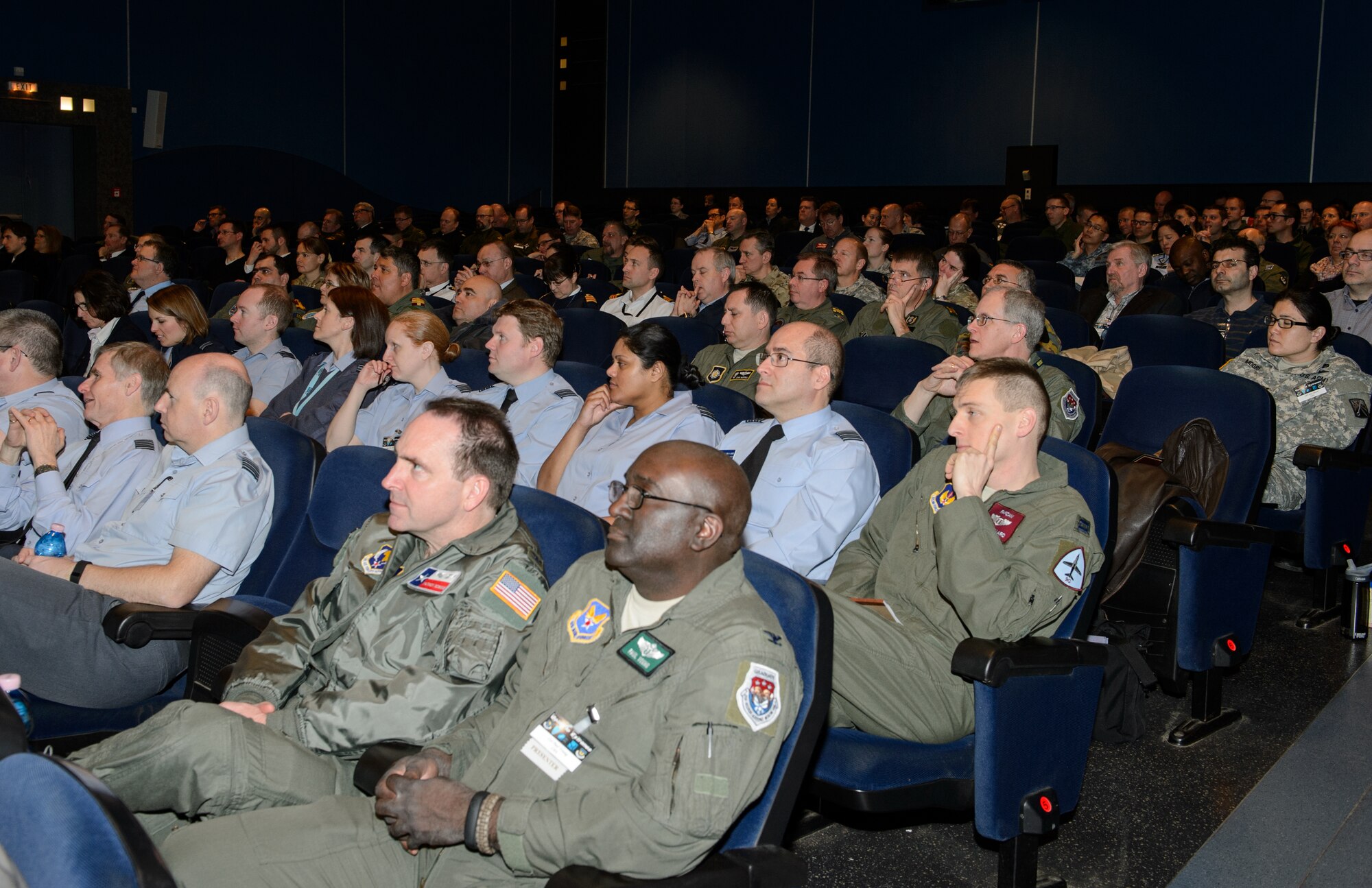 Medical professionals listen to a speaker at Ramstein Air Base, Germany, March 9, 2015. More than 200 gathered for the Ramstein Aerospace Medicine Summit and NATO Science and Technology Organization Technical Course to share knowledge and develop partnerships. (U.S. Air Force photo/Staff Sgt. Armando A. Schwier-Morales)