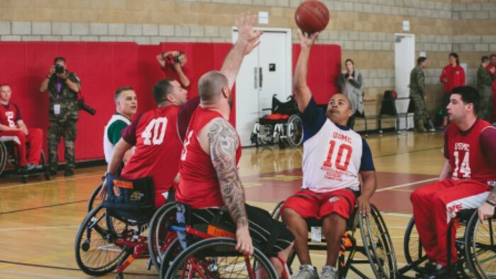 Marines,  veterans, and international allies compete a wheelchair basketball game during the Marine Corps Trials in various Paralympic events at Marine Corps Base Camp Pendleton, California March 4-12. Other events include: archery, cycling, field, shooting, sitting volleyball, swimming and track.