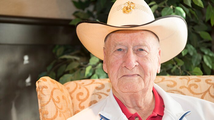 Marshall Harris, Marine survivor from the battle of Iwo Jima, poses for a photo during the Iwo Jima Battle Survivors and Family Association 70th anniversary reunion at Wichita Falls, Texas, February 14, 2015. Harris served with 2nd Armored Amphibian Tank Battalion during World War II.