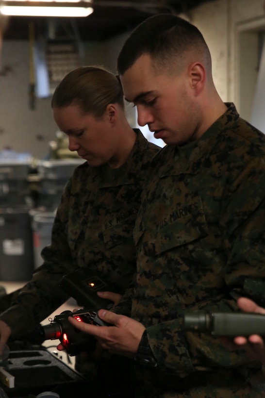 Lance Cpl. Joseph Kinch (right), a bulk fuel specialist with 8th Engineer Support Battalion, practices using a Joint Chemical Agent Detector during a chemical, biological, radiological and nuclear decontamination course aboard Camp Lejeune, N.C., March 3, 2015. Hands-on training with CBRN equipment allows Marines to get a higher level of understanding with gear they may be used to save other Marines’ lives.