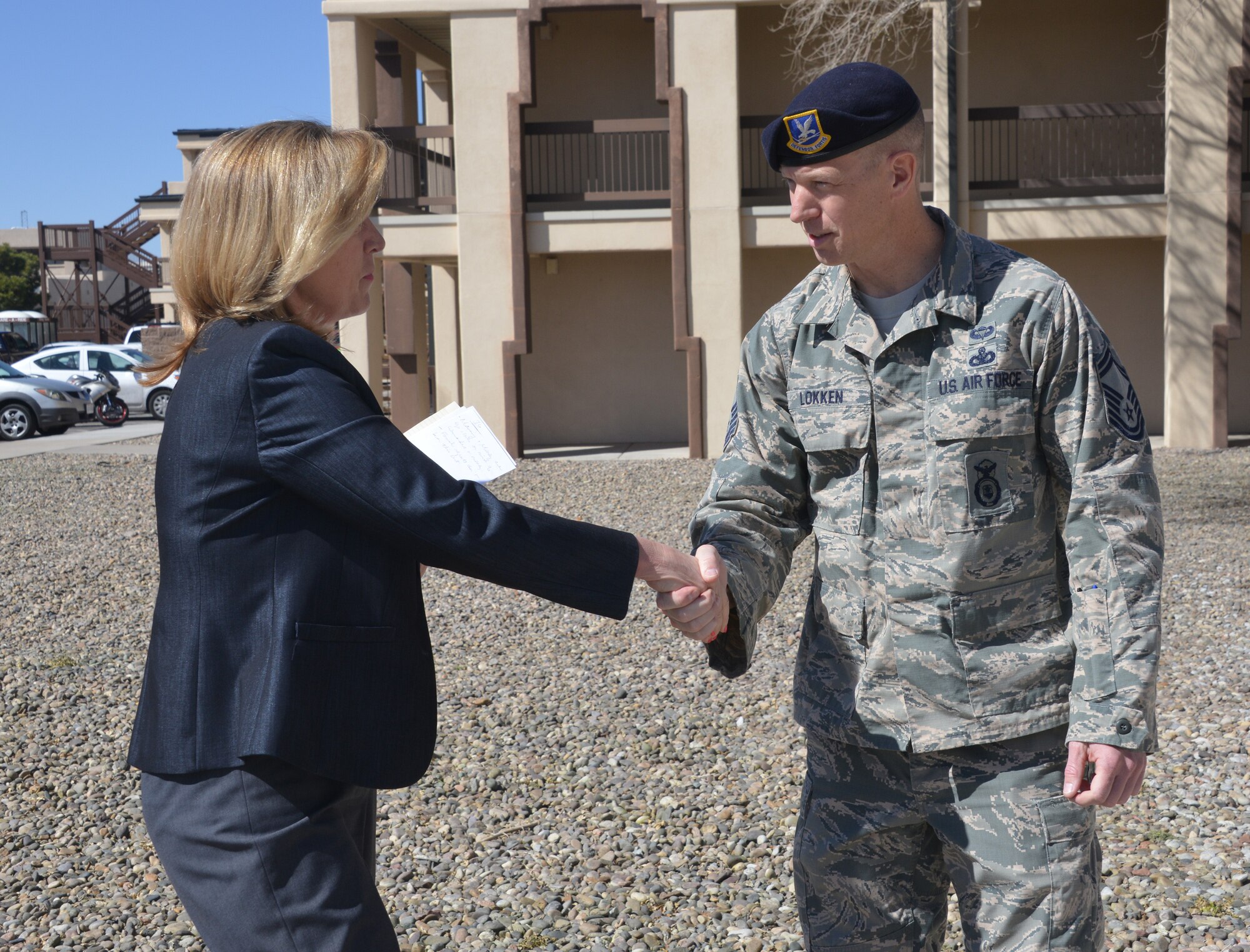 Secretary of the Air Force Deborah Lee James visits with Senior Airman William Rodriguez-Febrez during a lunch at March 11, 2015 at Kirtland Air Force Base, N.M. The luncheon was an opportunity for James to meet with Airmen from across Kirtland to discuss issues important to them. Rodriguez-Febrez is assigned to the 58th Operations Support Squadron. (Courtesty photo/Dennis Carlson)