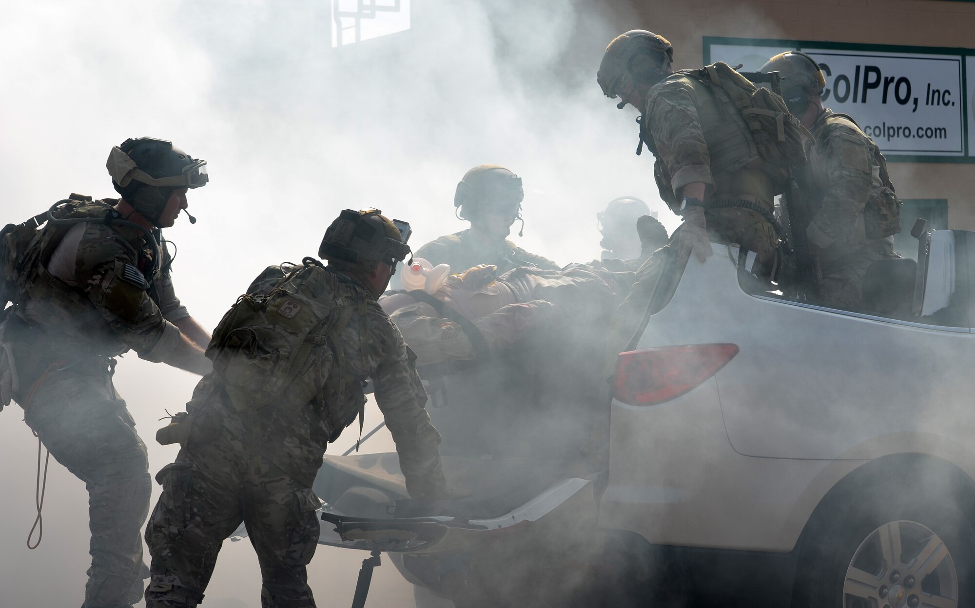 Pararescue Jumpers and Combat Rescue Officers from the 301st and 308th Rescue Squadron with the 920th Rescue Wing, Patrick AFB, FL, conduct search and rescue response after a simulated vehicle-borne improvised explosive device detonated March 10 and 11 in Perry, GA. This simulated exercise included two HH-60 Pave Hawk aircraft loading and off-loading rescuers as well as victims from the site of the explosion in Somalia. This four-day training exercise included simulated scenarios such as an earthquake, a vehicle-borne improved explosive device, active shooters and mass casualty response. (U.S. Air Force photo/Staff Sgt. Kelly Goonan)