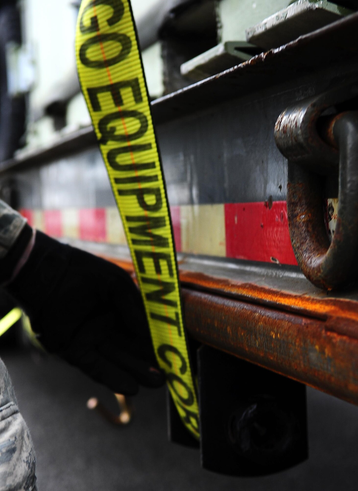 Senior Airman Tyler Enfinger, 1st Special Operations Logistics Readiness Squadron vehicle operations, secures a crate to a trailer at Hurlburt Field, Fla., Feb 24, 2015. Vehicle Operations Flight provides transportation services on demand for Hurlburt Field to include Distinguished Visitor support, base taxi, flight line operations and cargo pick-up and delivery services, and government driver's license issue. (U.S. Air Force photo/Airman 1st Class Andrea Posey)