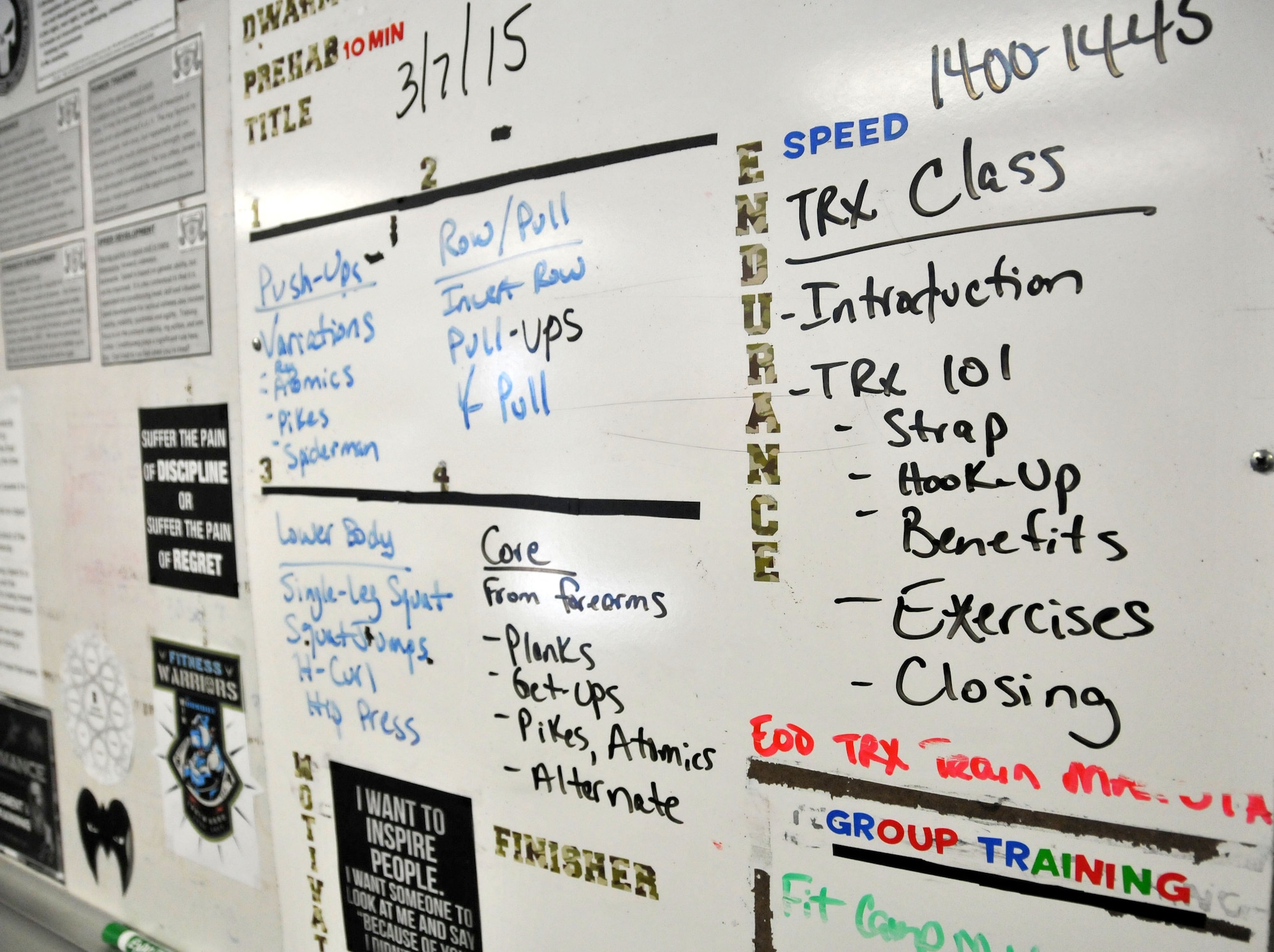 A whiteboard at that Dobbins’ Human Performance Center outlines the class schedule for March 7, 2015. TRX combines bodyweight with gravity to create several unique exercises. (U.S. Air Force photo/Senior Airman Andrew J. Park)