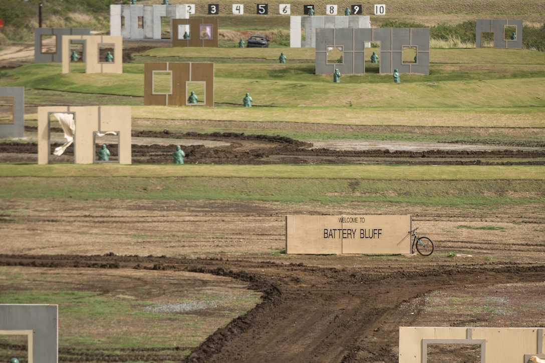 Battery Bluff, the new urban terrain, unknown-distance range aboard Marine Corps Base Hawaii, is officially up and running as of March 5, 2015. Marines with 2nd Battalion, 3rd Marine Regiment and soldiers with 563rd Engineer Company, 84th Engineer Battalion, Schofield Barracks were the first service members to put shots down the newly constructed range. (U.S. Marine Corps photo by Lance Cpl. Brittney Vella/Released)