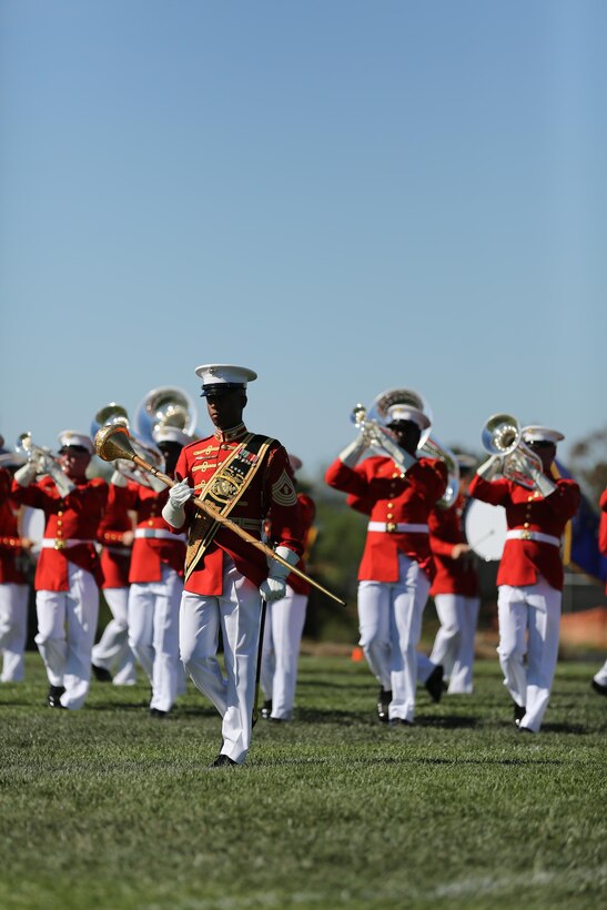 The drum major of the Drum and Bugle Corps marches during a performance aboard Marine Corps Air Station Miramar, Calif., March 13. The Battle Colors Ceremony consists of a performance by the Silent Drill Platoon and “the Commandant’s Own” Drum and Bugle Corps.