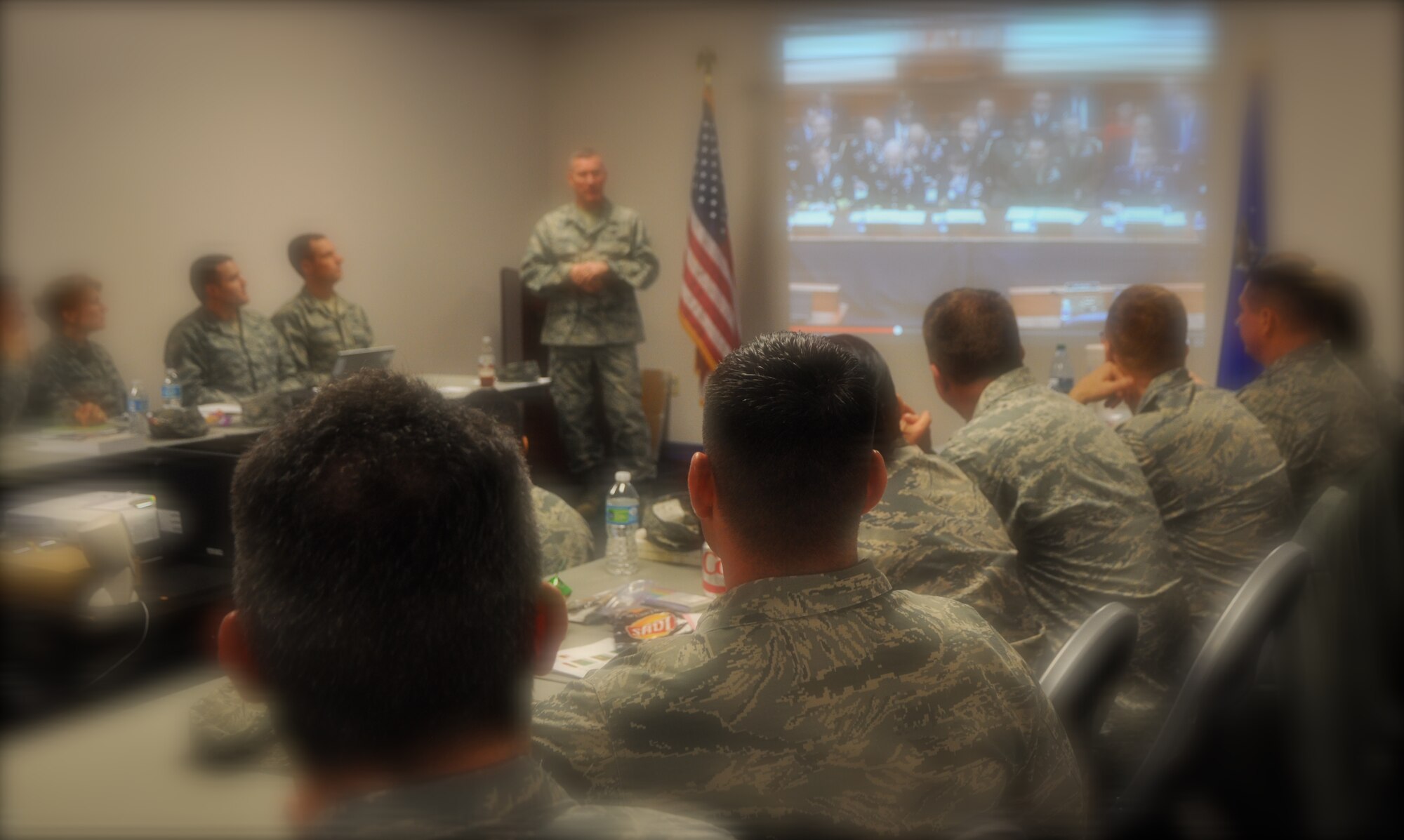 Maj. Gen. B. Edwin Wilson, 24th Air Force commander, spent time with cyber Reservists from the 960th Cyberspace Operations Group during the group’s commander’s forum held at Joint Base San Antonio-Lackland, Texas.  Here he speaks to the testimony he gave during a recent House Armed Services Committee meeting where he emphasized the urgency to build cyber capability and capacity and praised Air Force Reservists and Air Force Total Force Integration mission successes.  (U.S. Air Force photo by 1st Lt. Lori Fiorello/Released)