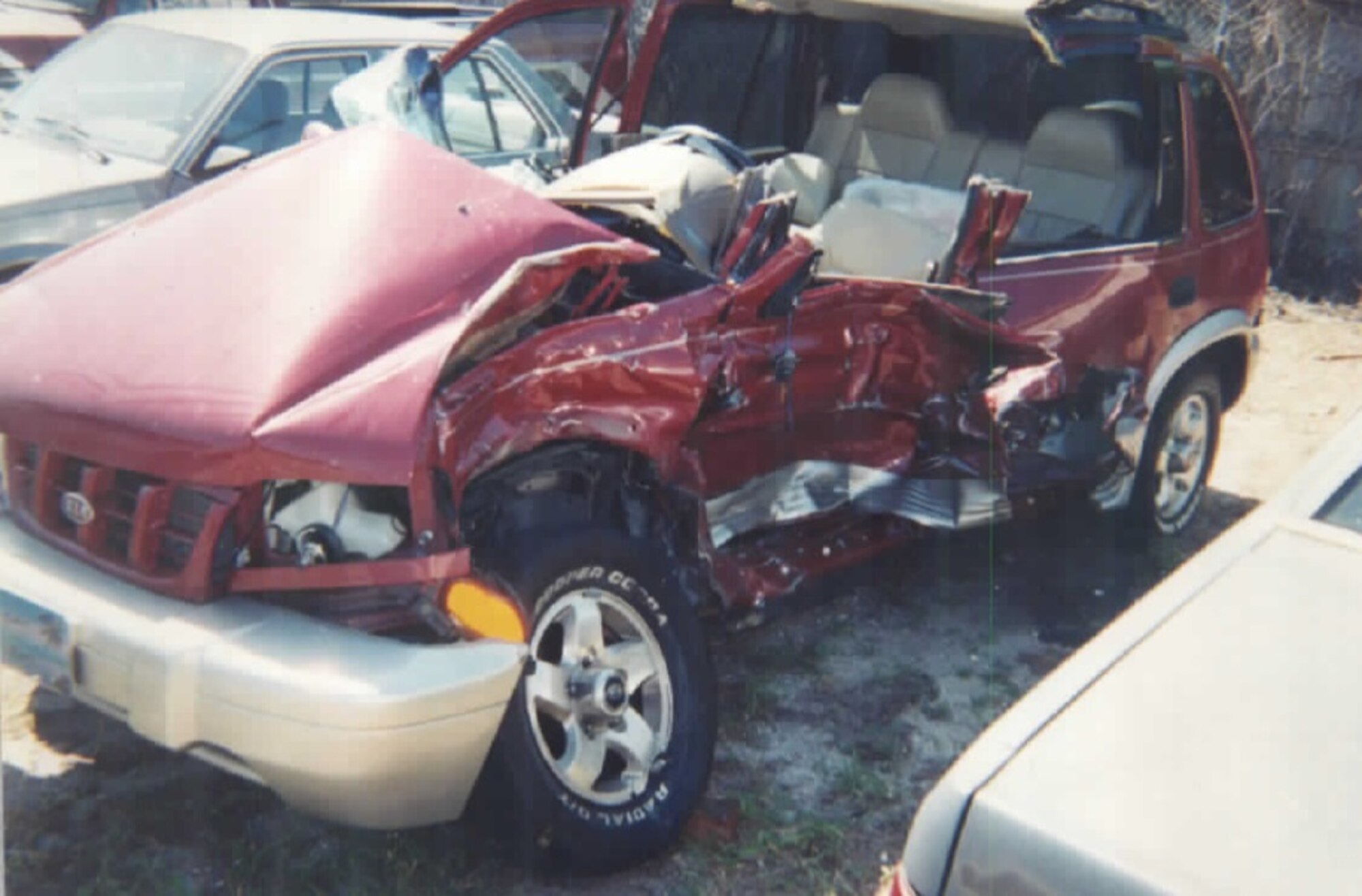 The car of Roberta Clark, 45th Space Wing Safety, is pictured following an accident at the main gate of Patrick Air Force Base, Fla., April 11, 2003. She was exiting the main gate when a vehicle ran the red light and stuck her. She spent three months in the hospital and a month in rehabilitation following the accident. (Courtesy photo)
