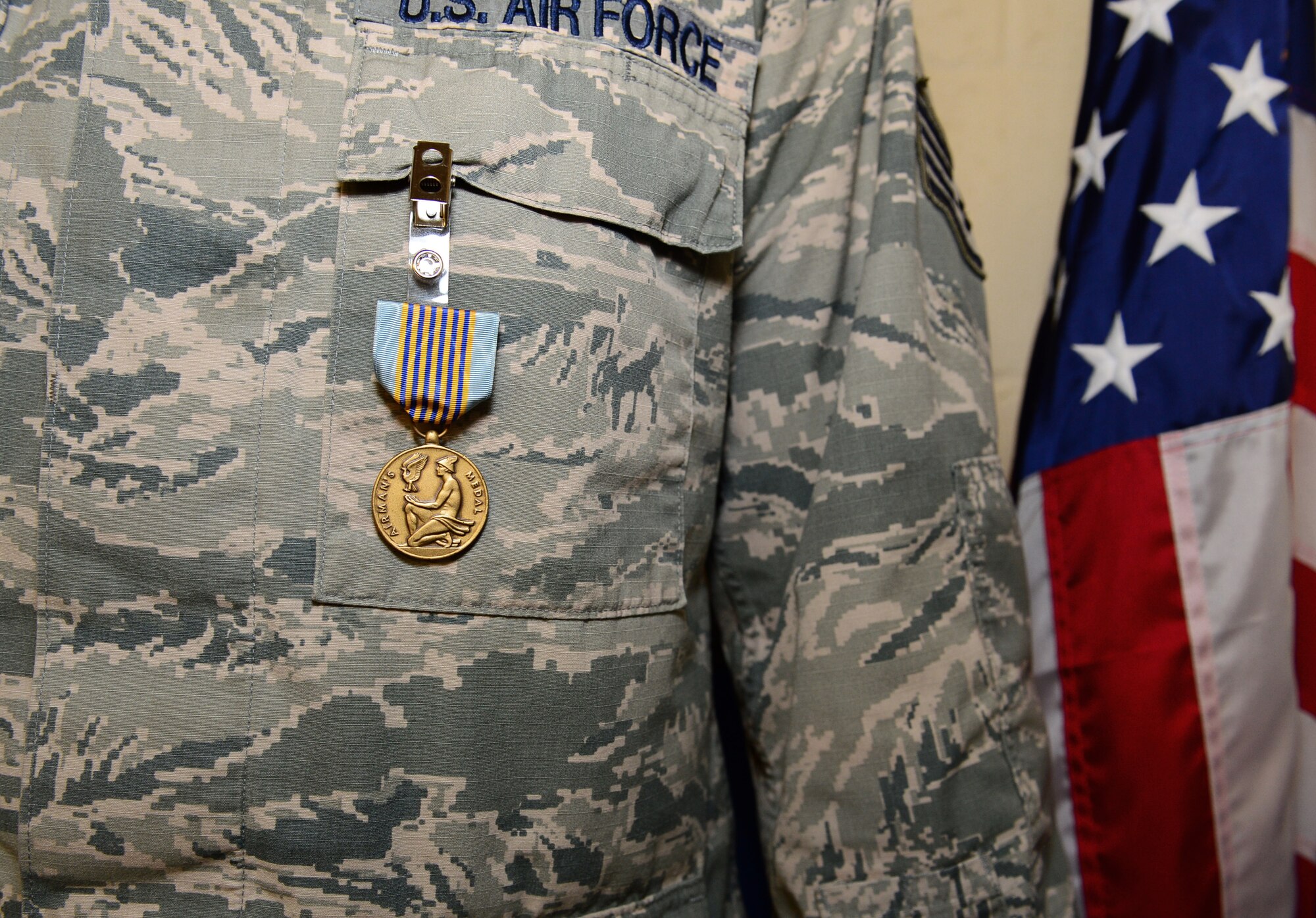 Staff Sgt. Greggory Swarz, 492nd Aircraft Maintenance Unit electrical environmental systems specialist, displays his Airman’s Medal after a ceremony held at Royal Air Force Lakenheath, England, March 13, 2015. Sawrz was recognized for his heroic actions on Jan. 26, 2015, when he saved the lives of three French airmen after a Hellenic Air Force F-16 crashed into the parking ramp at Los Llanos Air Base, Spain, during Tactical Leadership Program 15-1. (U.S. Air Force photo by Airman 1st Class Erin R. Babis/Released)