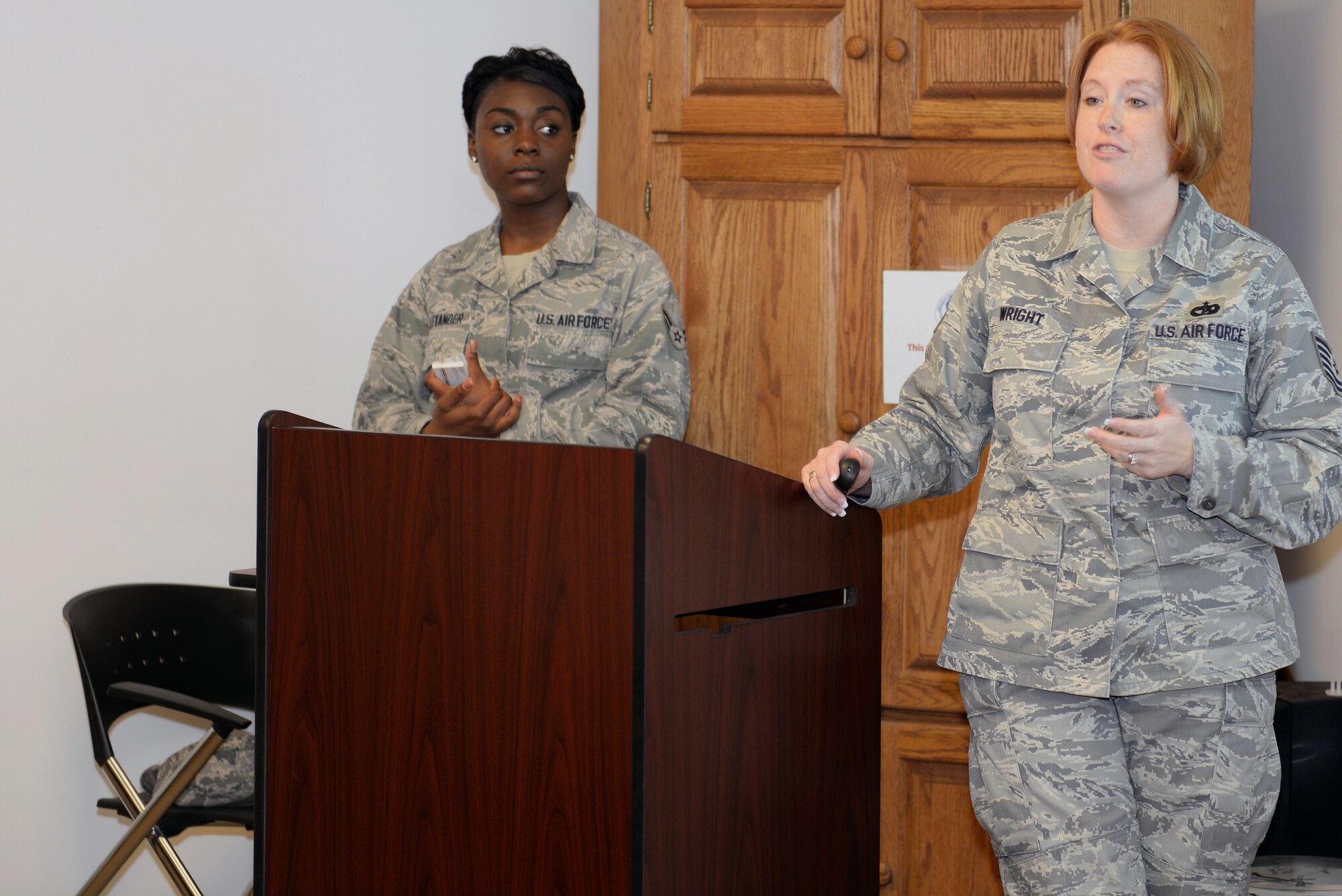 U.S. Air Force Tech. Sgt. Mindie Wright, 23d Logistics Readiness Squadron NCO in charge of personal property, discusses how to calculate the weight of rooms for shipment through the Defense Personal Property System. Wright also gave an overview on how to store vehicles during permanent change of station. (U.S. Air Force photo by Airman Greg Nash/Released)