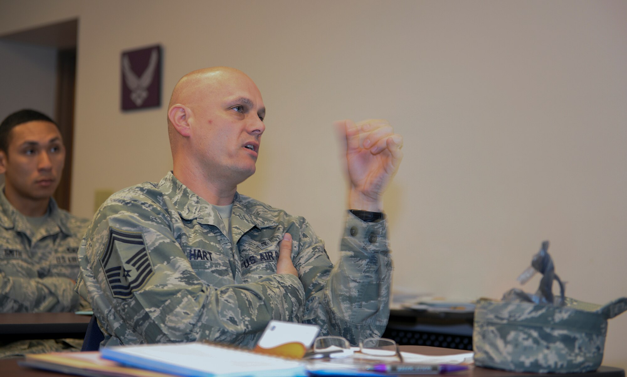 U.S. Air Force Senior Master Sgt. Stephen Hart, 23d Medical Operations Squadron superintendent, asks a question during a Smooth Move briefing March 11, 2015, at Moody Air Force Base, Ga. Hart asked about changes to the Defense Personal Property System that now require Airmen to handle their own shipment requests. (U.S. Air Force photo by Airman Greg Nash/Released)