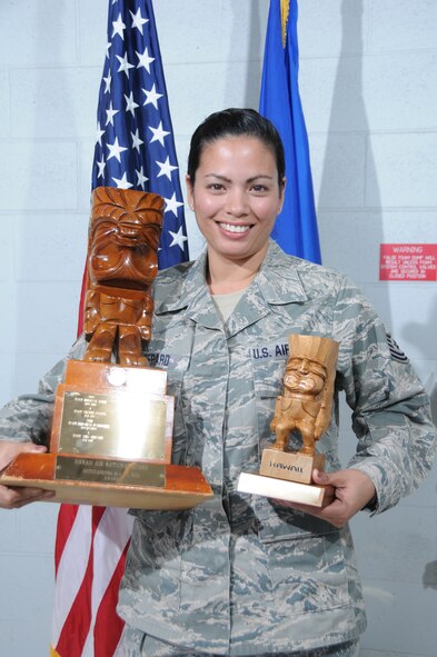 U.S. Air Force Tech. Sgt. Amy Gerard, Hawaii Air National Guard 154th Medical Group, wins the Traditional Non Commissioned Officer of the Year Award during the 2015 Launa 'Ole Awards ceremony at Joint Base Pearl Harbor-Hickam, Hawaii, March 8, 2015. Gerard helped organize and streamline the Optometry section, enabling an efficient process in servicing over 2500 members of the Hawaii ANG and also tracks and coordinates all the education and training for J1 personnel within PACOM’s Special Ops Command. (U.S. Air National Guard photo by Airman 1st Class Robert Cabuco)


