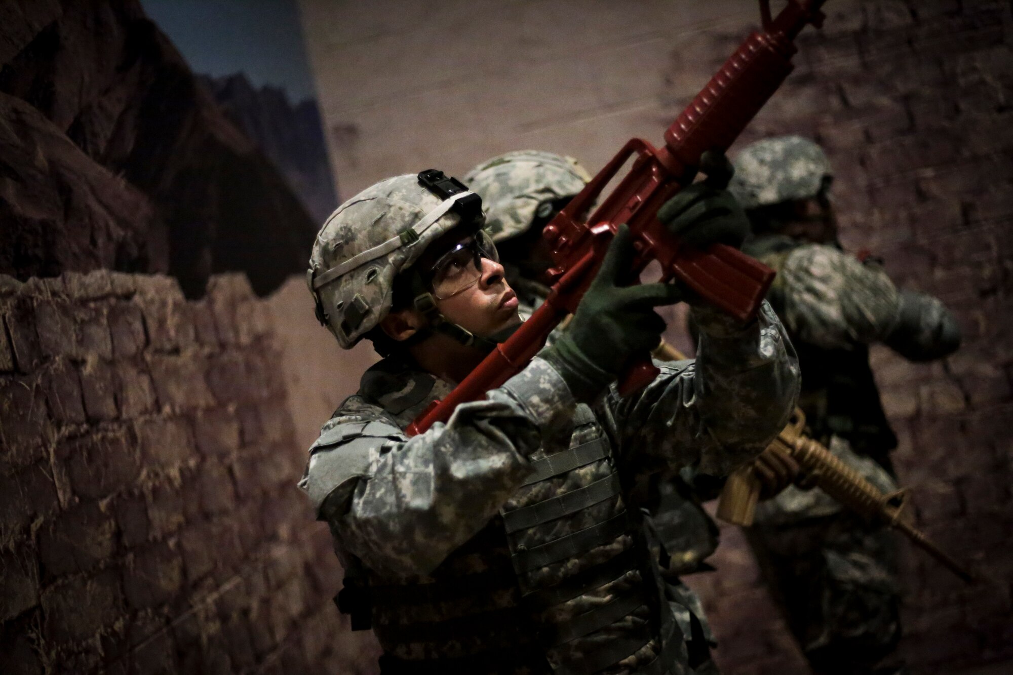 U.S. Army Soldiers participate in a Modern Army Combatives Program (MACP) training scenario at the New Jersey National Guard Training and Training Technology Battle Lab at Joint Base McGuire-Dix-Lakehurst, N.J., March 11, 2015. The Battle Lab features numerous combat simulators, as well as an indoor urban area for ground combat training. (U.S. Air National Guard photo by Tech. Sgt. Matt Hecht/Released)