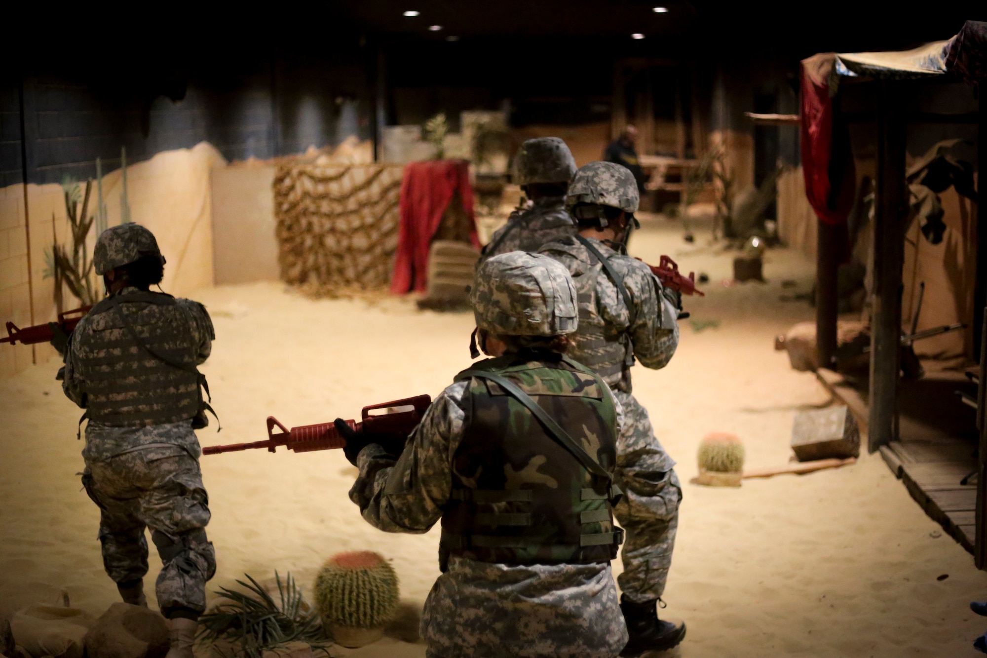 U.S. Army Soldiers participate in a Modern Army Combatives Program (MACP) training scenario at the New Jersey National Guard Training and Training Technology Battle Lab at Joint Base McGuire-Dix-Lakehurst, N.J., March 11, 2015. The Battle Lab features numerous combat simulators, as well as an indoor urban area for ground combat training. (U.S. Air National Guard photo by Tech. Sgt. Matt Hecht/Released)