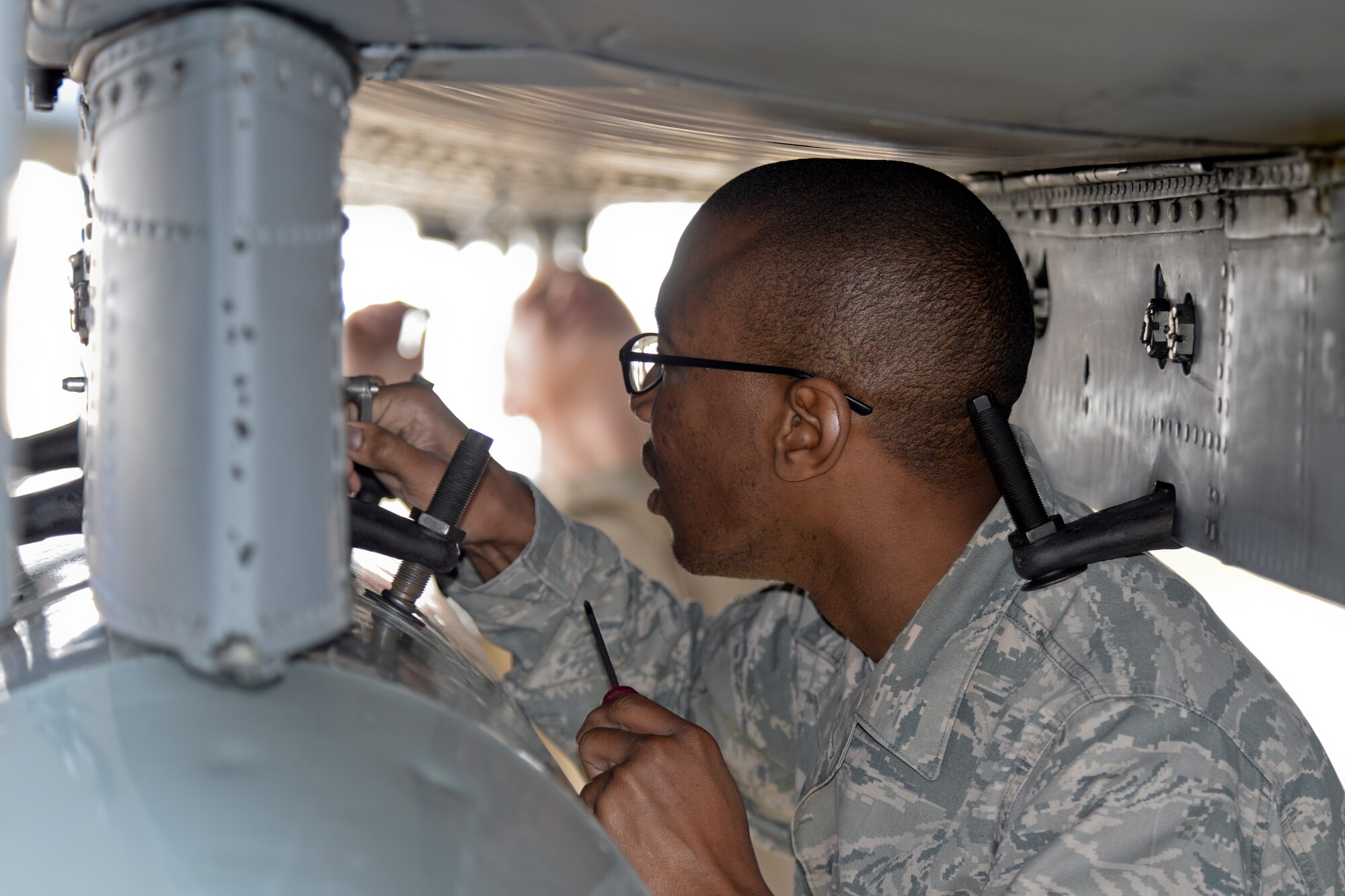 A 355th Fighter Wing maintainer recovers an A-10C Thunderbolt II at Royal Air Force Lakenheath, England, after a sortie March 13, 2015. The A-10s and Airmen are deployed out of Davis-Monthan Air Force Base, Ariz., as part of a Theater Security Package in support of Operation Atlantic Resolve. While deployed, they have conducted training alongside NATO allies to strengthen interoperability and demonstrate U.S. commitment to the security and stability of Europe. (U.S. Air Force photo by Airman 1st Class Trevor T. McBride/Released)