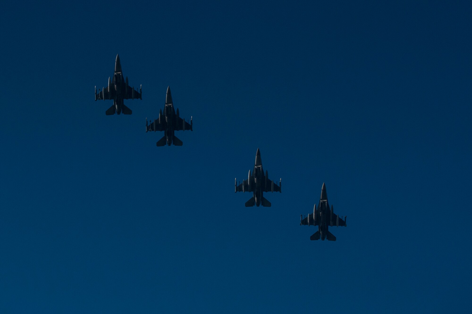 A formation of four U.S. Air Force F-16 Fighting Falcon fighter aircraft assigned to the 480th Fighter Squadron fly over Spangdahlem Air Base, Germany, March 13, 2015. The aircraft will participate in Dacian Warhawk 2015, a bilateral flying training deployment between the U.S. and Romanian air forces at Campia Turzii, Romania, March 16-27, 2015. The exercise aims to strengthen the NATO partners’ interoperability and their readiness to conduct combined air operations. (U.S. Air Force photo by Senior Airman Rusty Frank/Released)