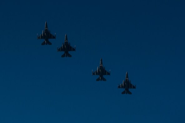 A formation of four U.S. Air Force F-16 Fighting Falcon fighter aircraft assigned to the 480th Fighter Squadron fly over Spangdahlem Air Base, Germany, March 13, 2015. The aircraft will participate in Dacian Warhawk 2015, a bilateral flying training deployment between the U.S. and Romanian air forces at Campia Turzii, Romania, March 16-27, 2015. The exercise aims to strengthen the NATO partners’ interoperability and their readiness to conduct combined air operations. (U.S. Air Force photo by Senior Airman Rusty Frank/Released)