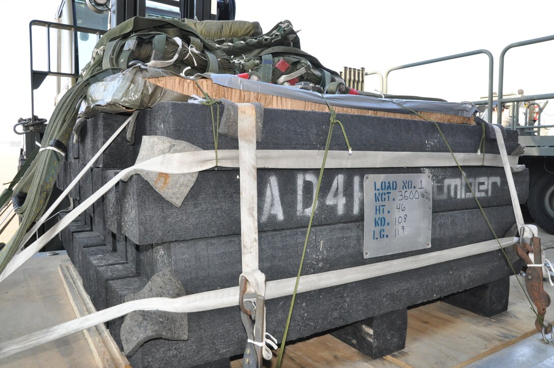 YOUNGSTOWN AIR RESERVE STATION, Ohio – A 3600 pound Heavy Airdrop Platform sits on the flightline here, March 8, 2015. Citizen Airmen, assigned to the 76th Aerial Port Squadron, prepared the parachute-equipped pallet, which simulates heavy equipment, for loading aboard a 910th Airlift Wing C-130H Hercules aircraft for an airdrop training mission. The wing uses their C-130 aircraft during combat operations, including low-level infiltration flights, to deliver personnel and materials by airdrop or air-land methods as part of their wartime tasking and to conduct humanitarian relief efforts. U.S. Air Force photo by Master Sgt. Bob Barko Jr. 