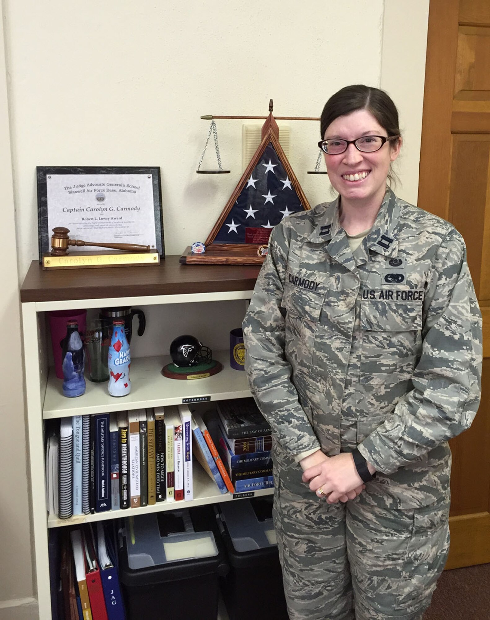 Standing up Wright-Patterson Air Force Base’s Special Victims’ Counsel Program office is Capt. Carolyn Carmody, who is currently working in the Arnold House, Bldg. 8 in Area A. (Skywrighter photo by Amy Rollins) 